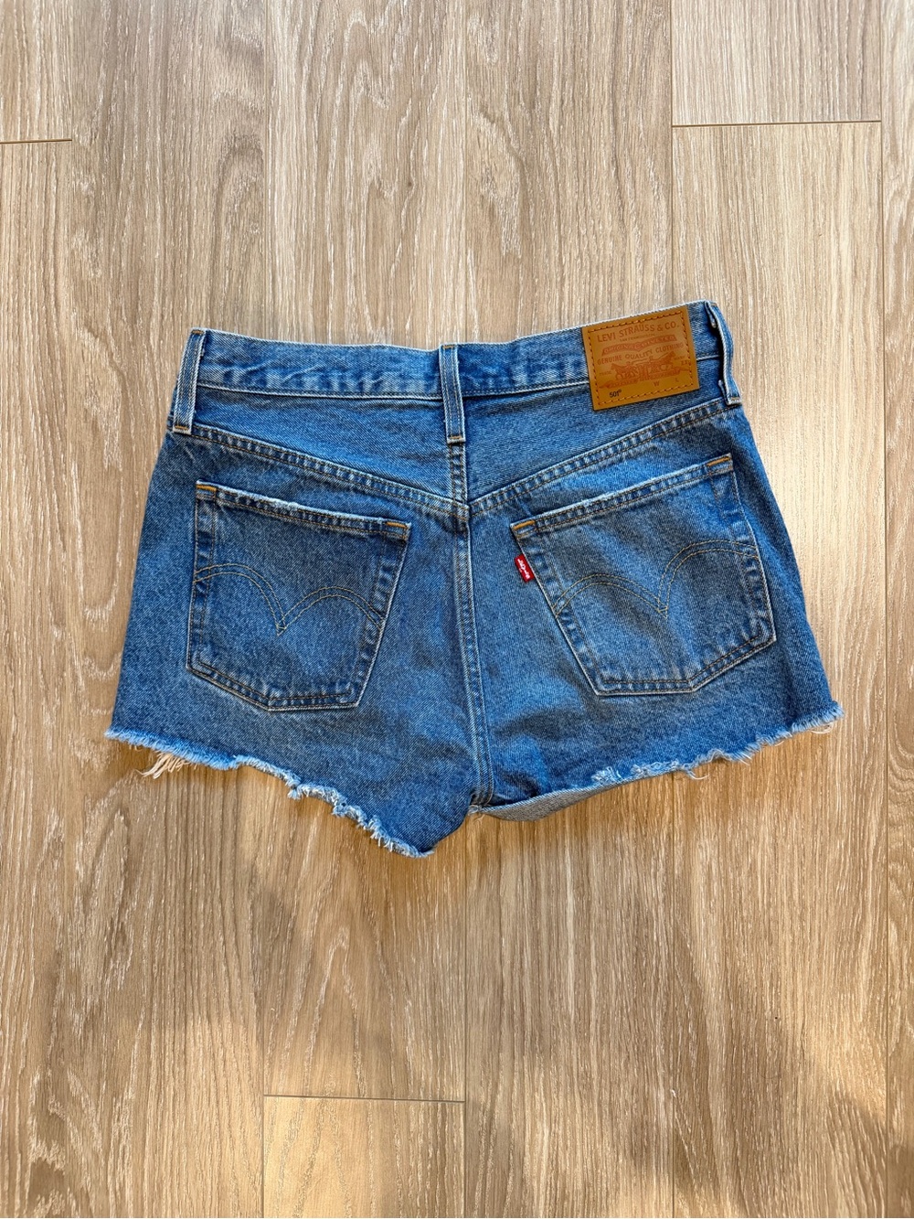 Levi's Medium Blue Denim Cutoff Shorts with Frayed Hem